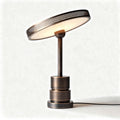 Metal table lamp with circular shade and perforated design 30 x 30 x 60cm